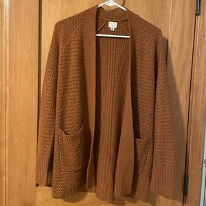 dark orange cardigan sweater